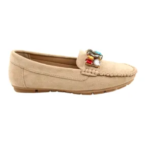 Beige suede moccasins with comfortable fit and stone embellishments.