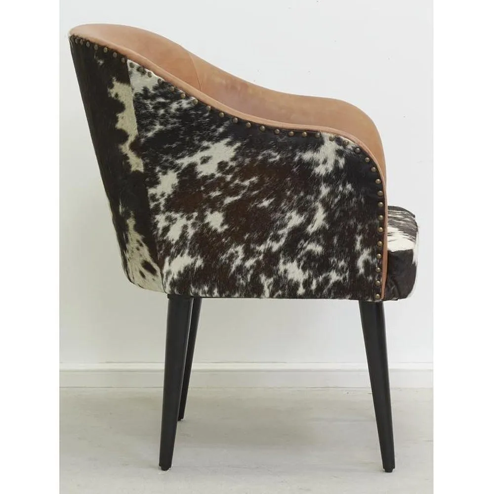 Fauteuil en cuir camel et peau de vache