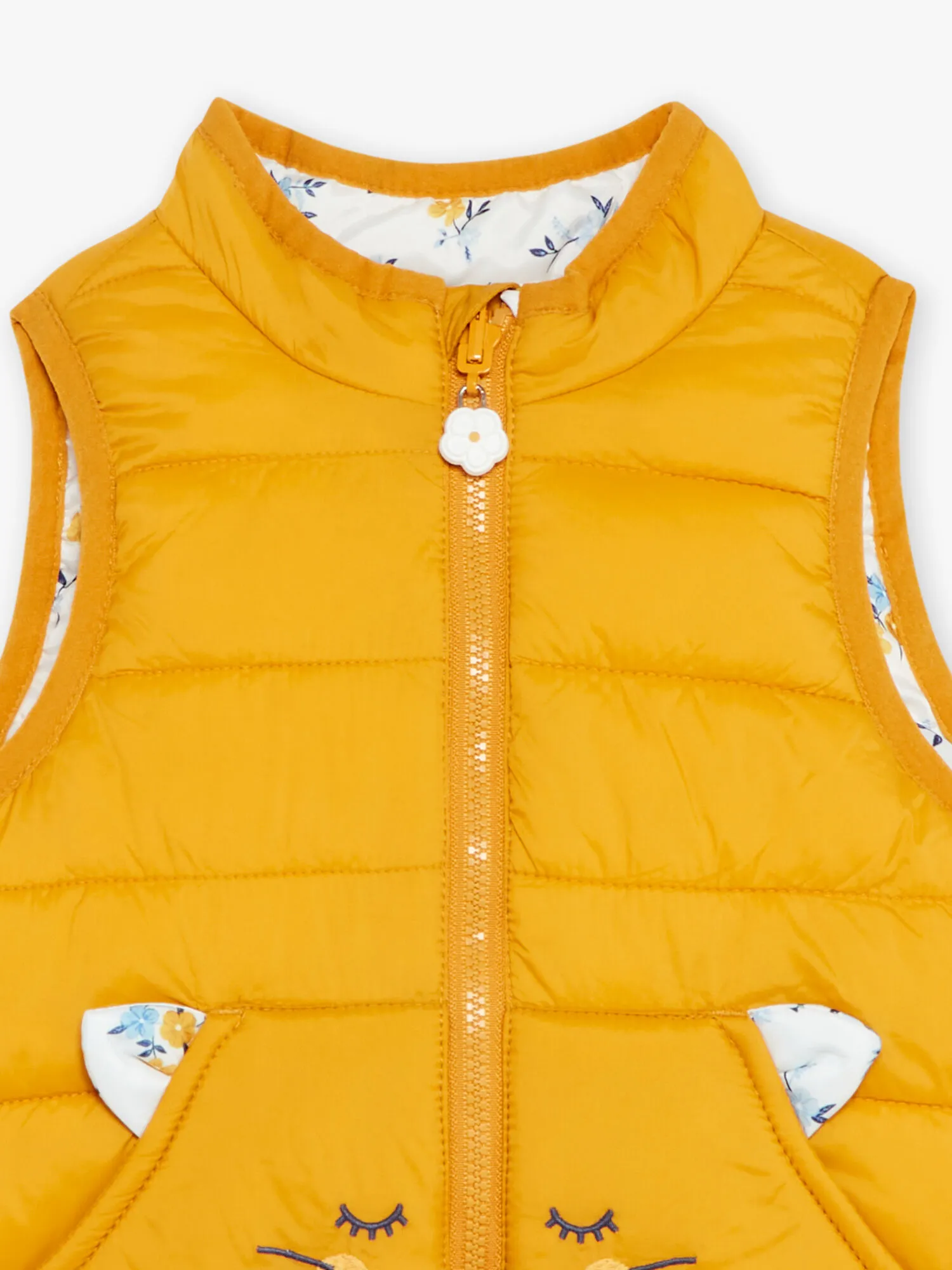Reversible yellow amber sleeveless puffer coat