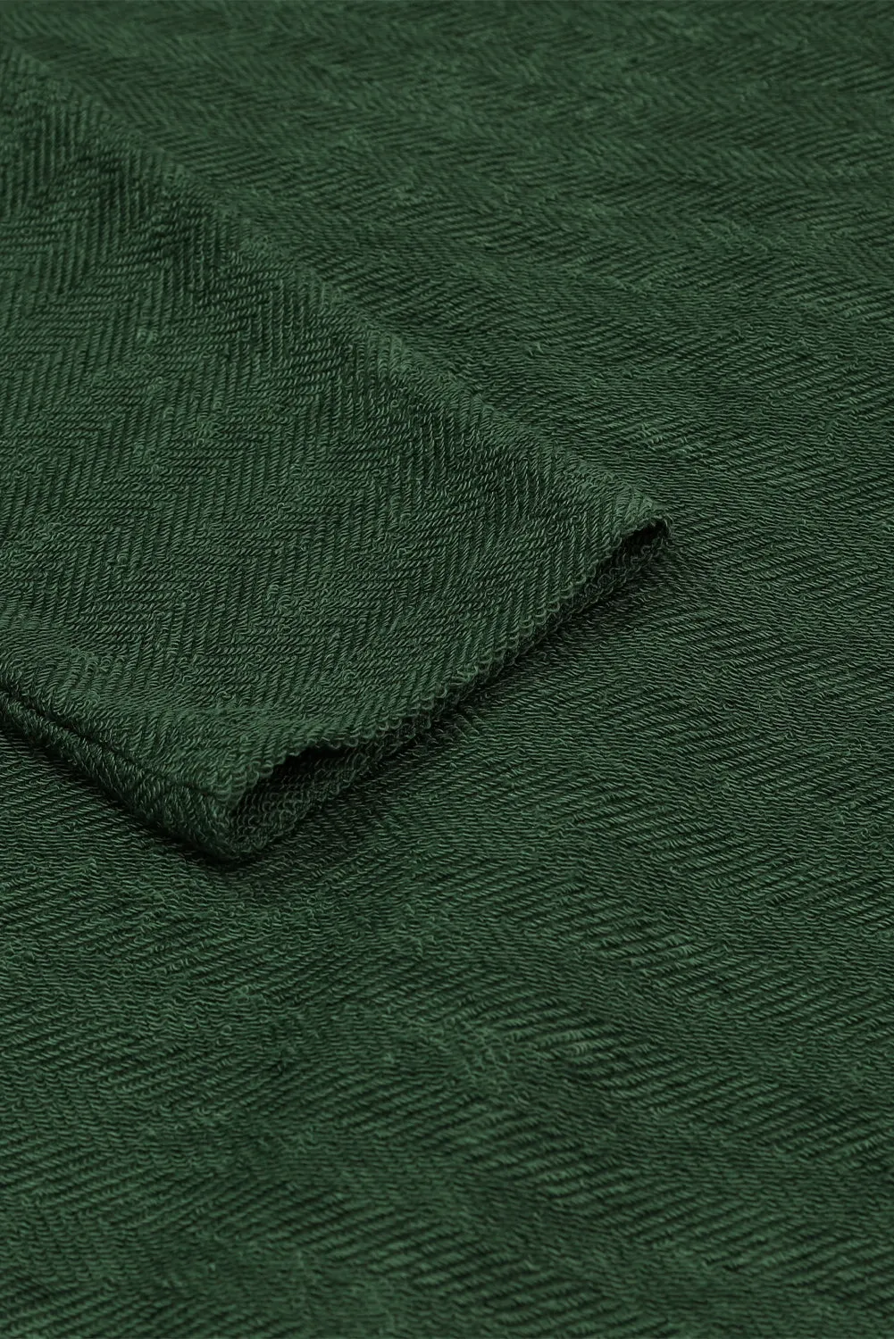 Veste décontractée verte avec poches à rabat contrastées